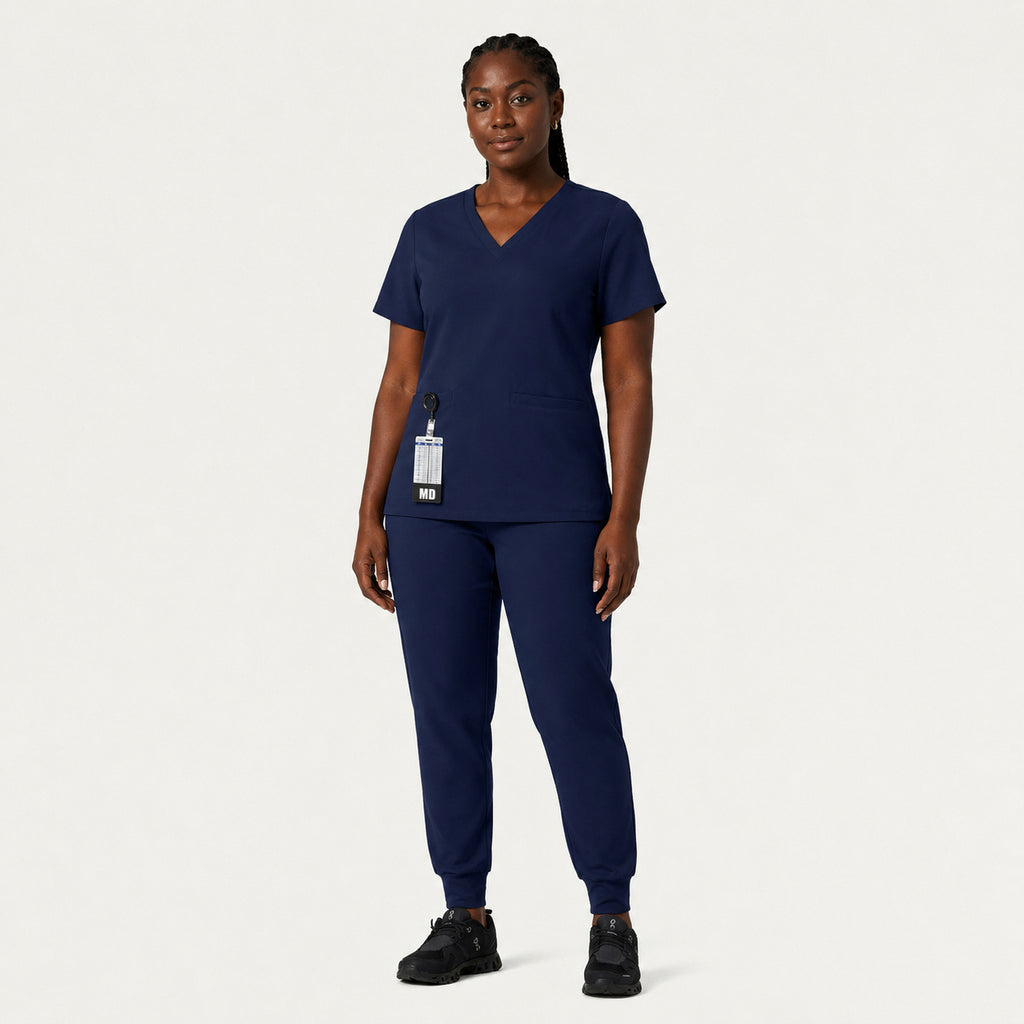Lyra Slim Scrub Top - Midnight Navy pocket detail